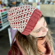 Person wearing a patterned knit Tincture hat by Andrea Mowry